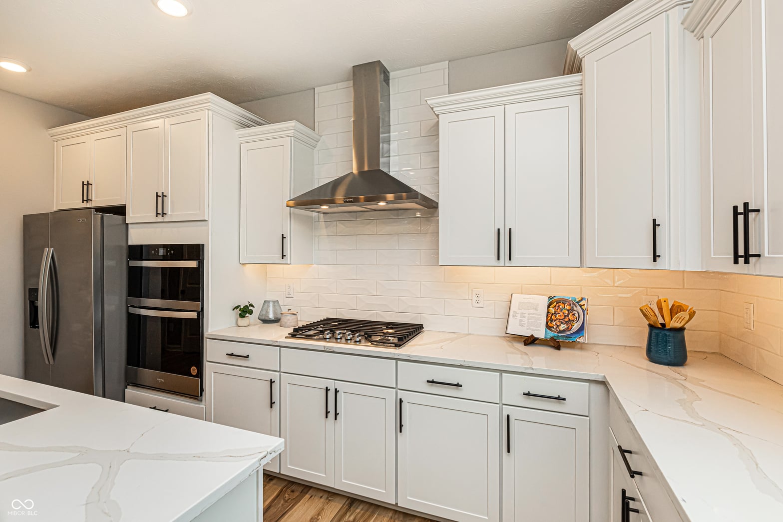 Bright, modern kitchen with high-end finishes throughout.