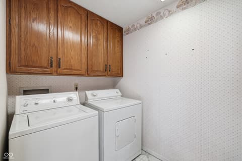 Laundry room at 1602 Queensbridge Square, Indianapolis, IN