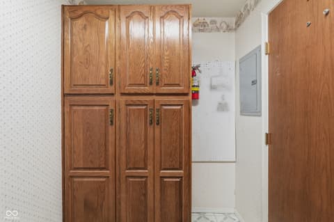 Laundry room at 1602 Queensbridge Square, Indianapolis, IN
