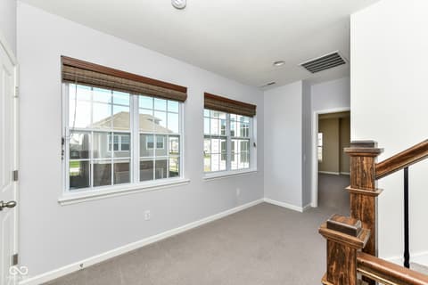 Bonus room at 13201 E 131st Street, Fishers, IN — Bright bonus room with abundant natural light and views.