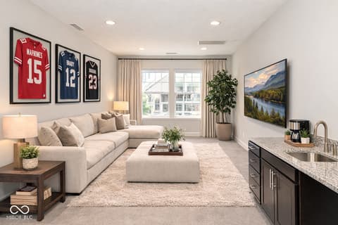 Living room at 13201 E 131st Street, Fishers, IN — Bright open-concept living space with modern finishes.