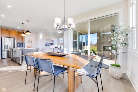 Dining room at 15709 Showdown Road, Noblesville, IN — Bright open concept with expansive views to backyard.