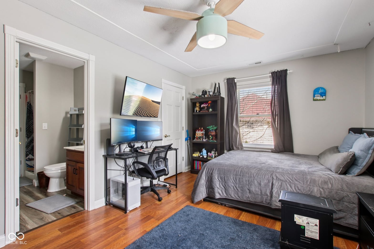 Spacious primary suite with ensuite bath and office nook.