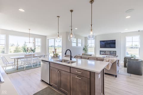 Kitchen at 15732 Showdown Road, Noblesville, IN — Bright, open kitchen with island and expansive window views.