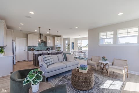 Family room at 15732 Showdown Road, Noblesville, IN — Bright, open-concept living with modern farmhouse charm.