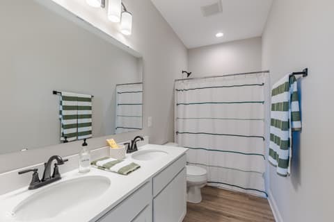 Primary bathroom at 15732 Showdown Road, Noblesville, IN — Spacious primary bath with dual vanity and walk-in shower.