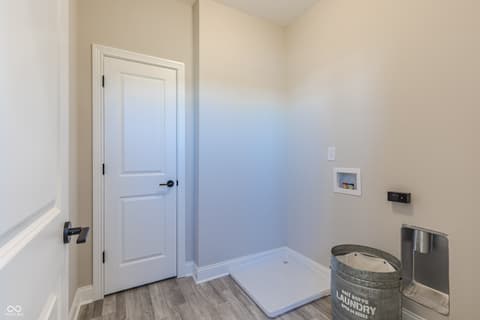Laundry room at 15732 Showdown Road, Noblesville, IN — Bright, modern laundry room with efficient layout.