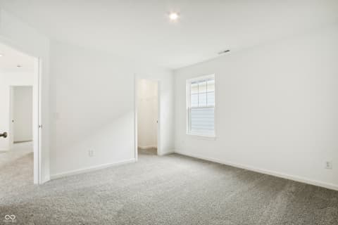Bedroom at 15742 Showdown Road, Noblesville, IN — Bright, spacious bedroom with abundant natural light.