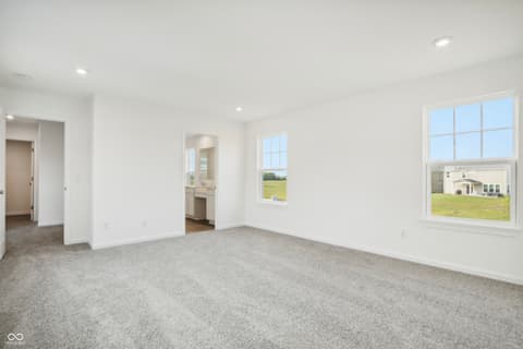 Primary bedroom at 15742 Showdown Road, Noblesville, IN — Spacious primary suite with abundant natural light.
