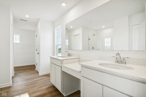Primary bathroom at 15742 Showdown Road, Noblesville, IN — Spacious primary bath with dual vanity and walk-in shower.
