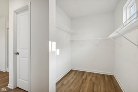 Bedroom at 15742 Showdown Road, Noblesville, IN — Spacious walk-in closet with excellent natural light.