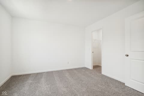 Bedroom at 15742 Showdown Road, Noblesville, IN — Bright, spacious bedroom with walk-in closet access.