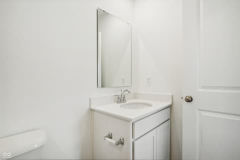 Bathroom at 15742 Showdown Road, Noblesville, IN — Clean, modern bathroom with updated fixtures and storage.