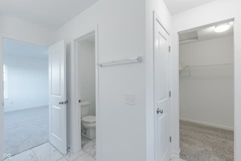 Primary bathroom at 15752 Showdown Road, Noblesville, IN — Luxurious primary bath suite with separate spaces.
