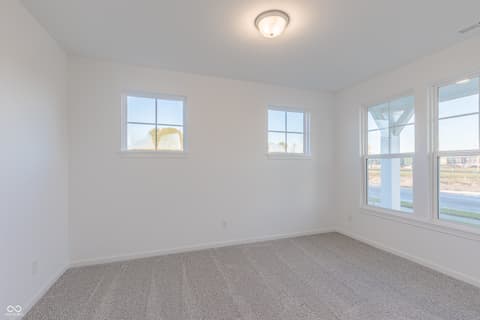 Bedroom at 15752 Showdown Road, Noblesville, IN — Bright bedroom with abundant windows and natural light.