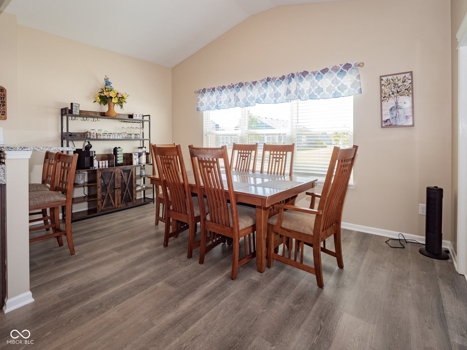 Bright open dining area with abundant natural light.