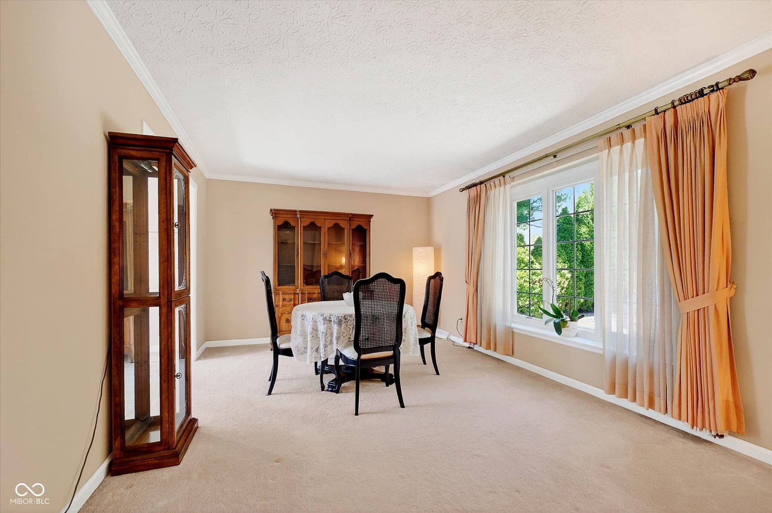 Spacious formal dining room with elegant traditional appointments.