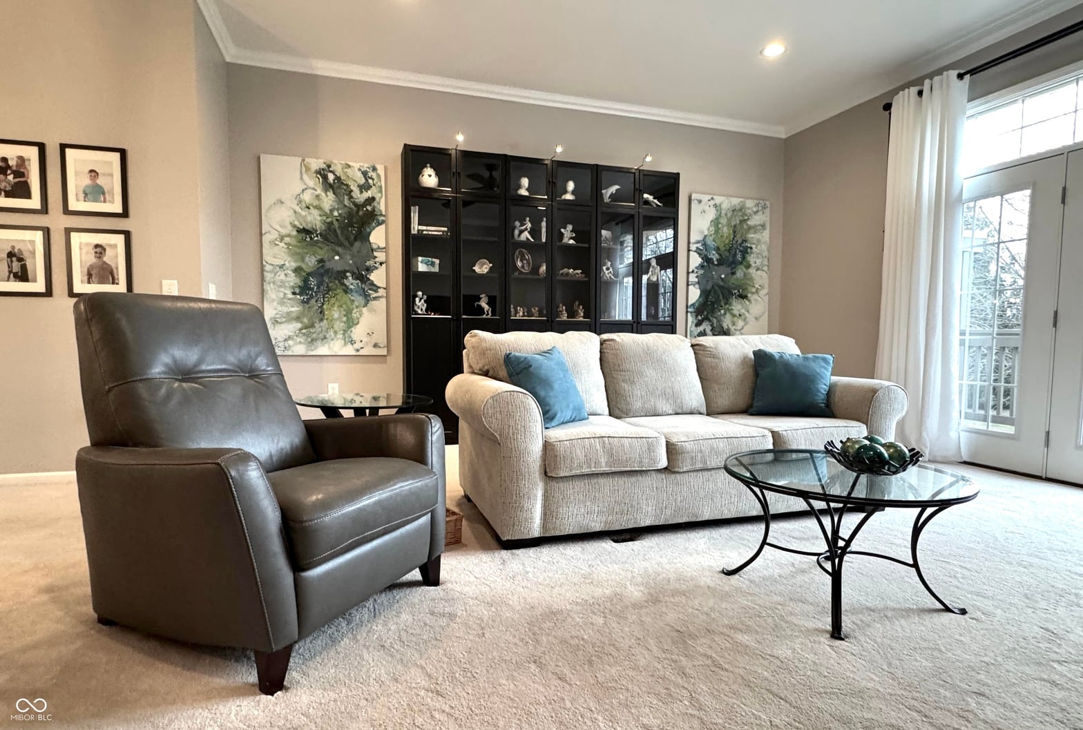 Bright, sophisticated living room with built-in storage.