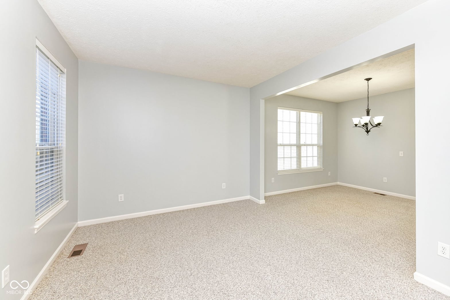 Bright, spacious living area with modern updates.