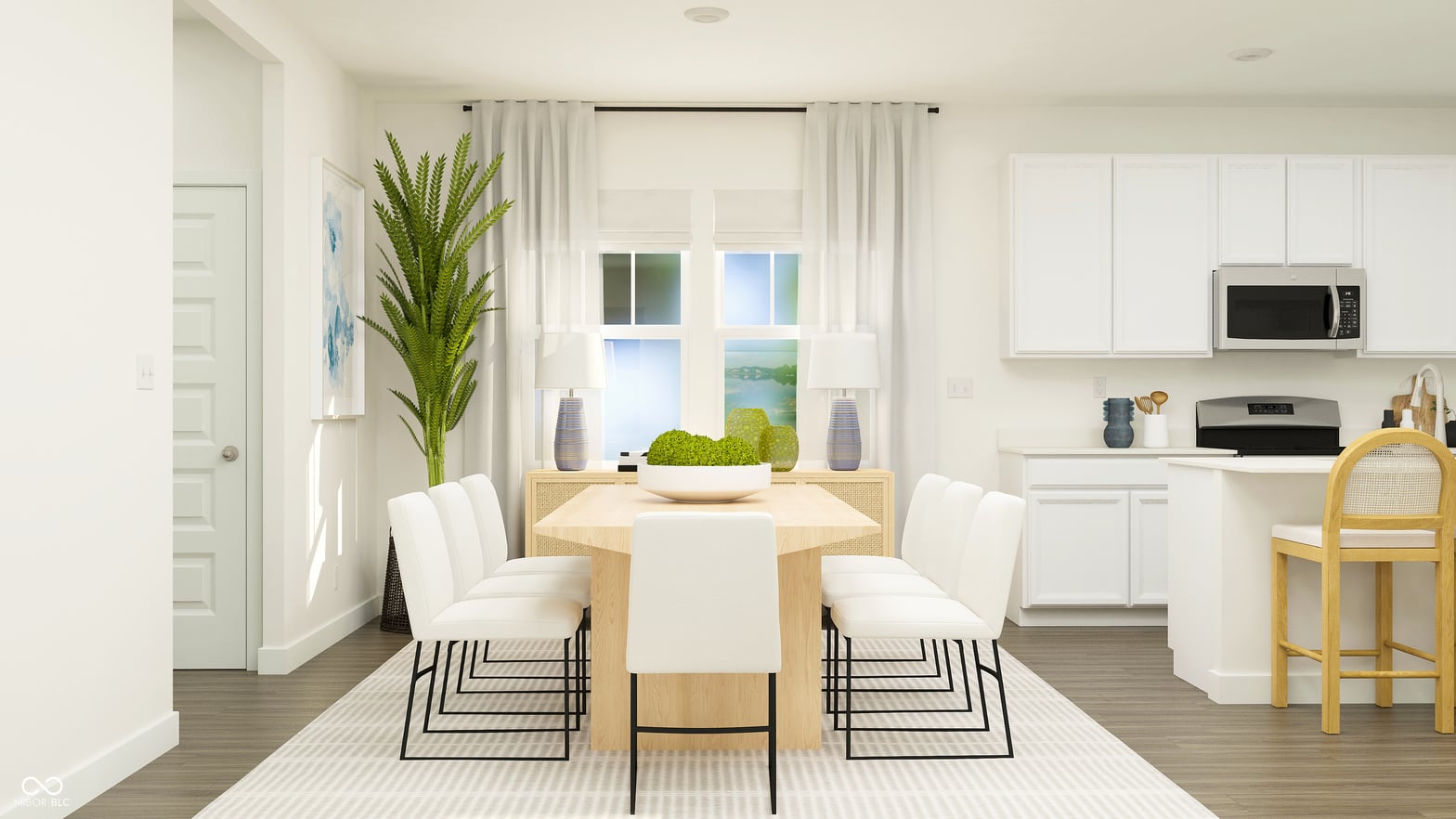Bright contemporary dining space with open kitchen flow.