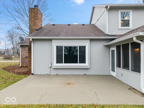 Front exterior at 792 Grace Drive, Carmel, IN — Charming updated home with modern siding and covered porch.