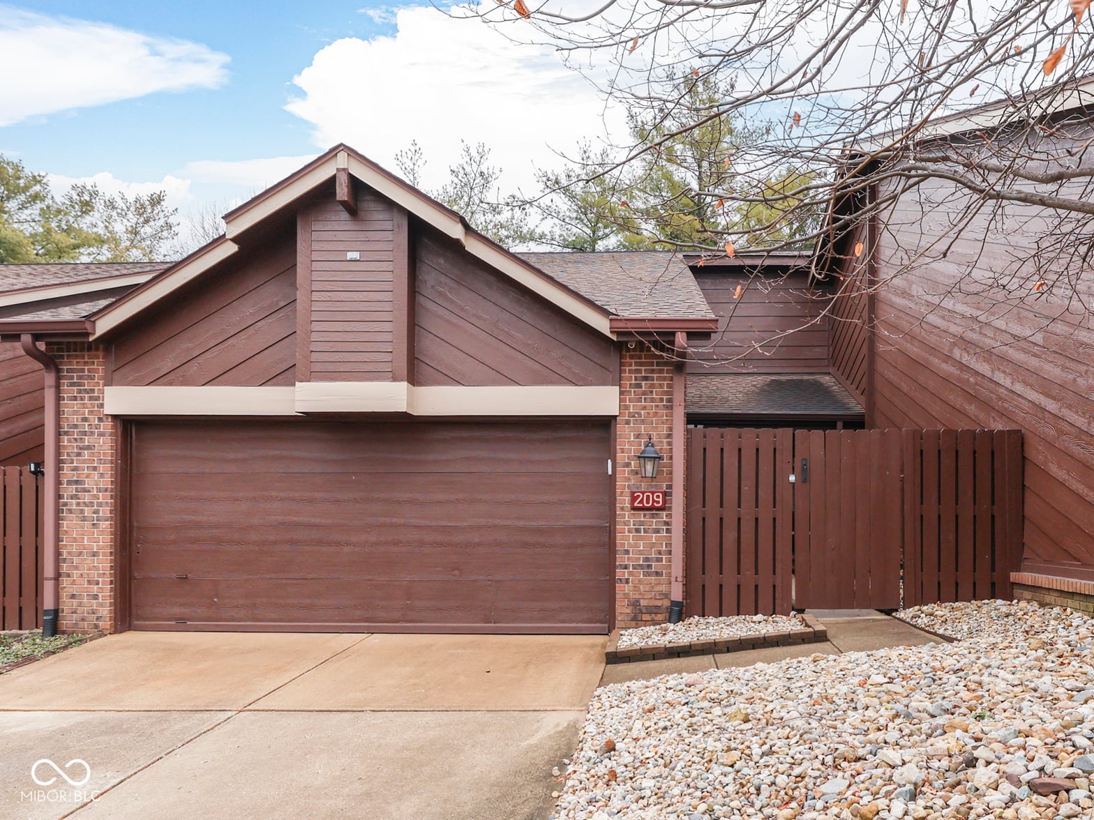 Front exterior at 209 Brighton Court, Greenwood, IN
