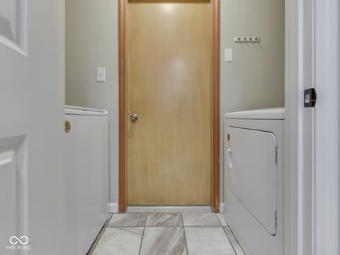 Laundry room at 209 Brighton Court, Greenwood, IN