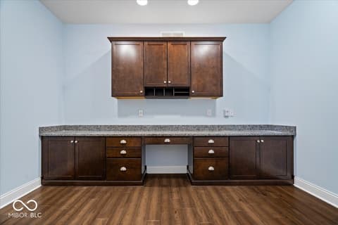 Bonus room at 16540 Shore Oaks Court, Noblesville, IN — Versatile bonus room with quality cabinetry and workspace.