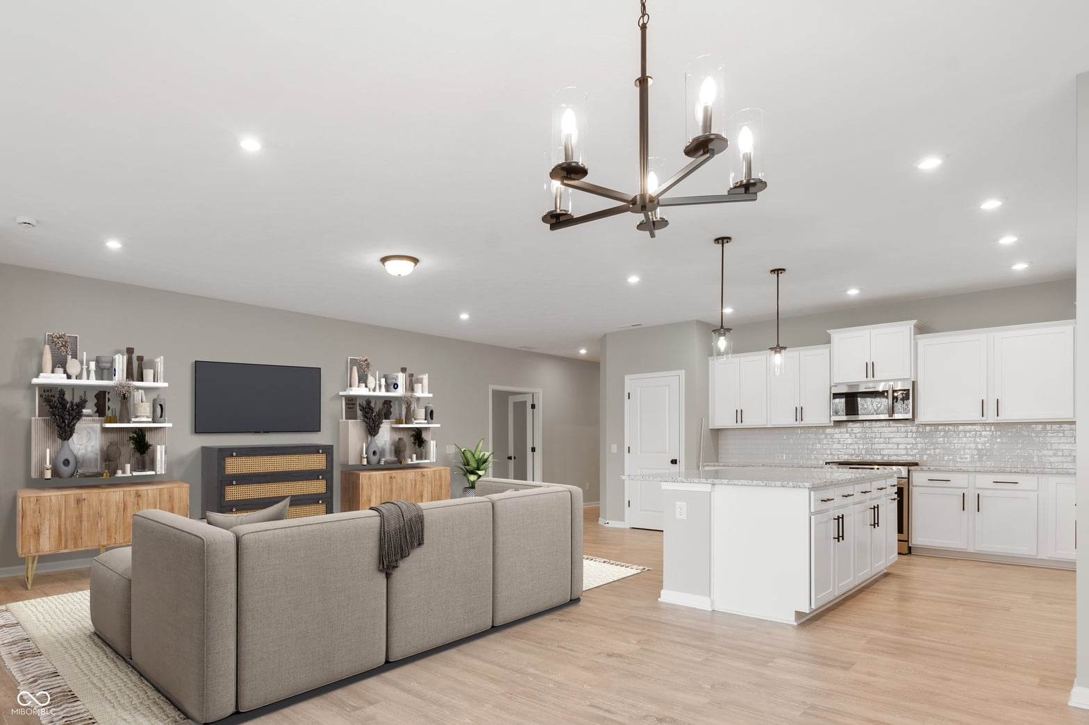 Modern open concept with updated kitchen and fireplace.