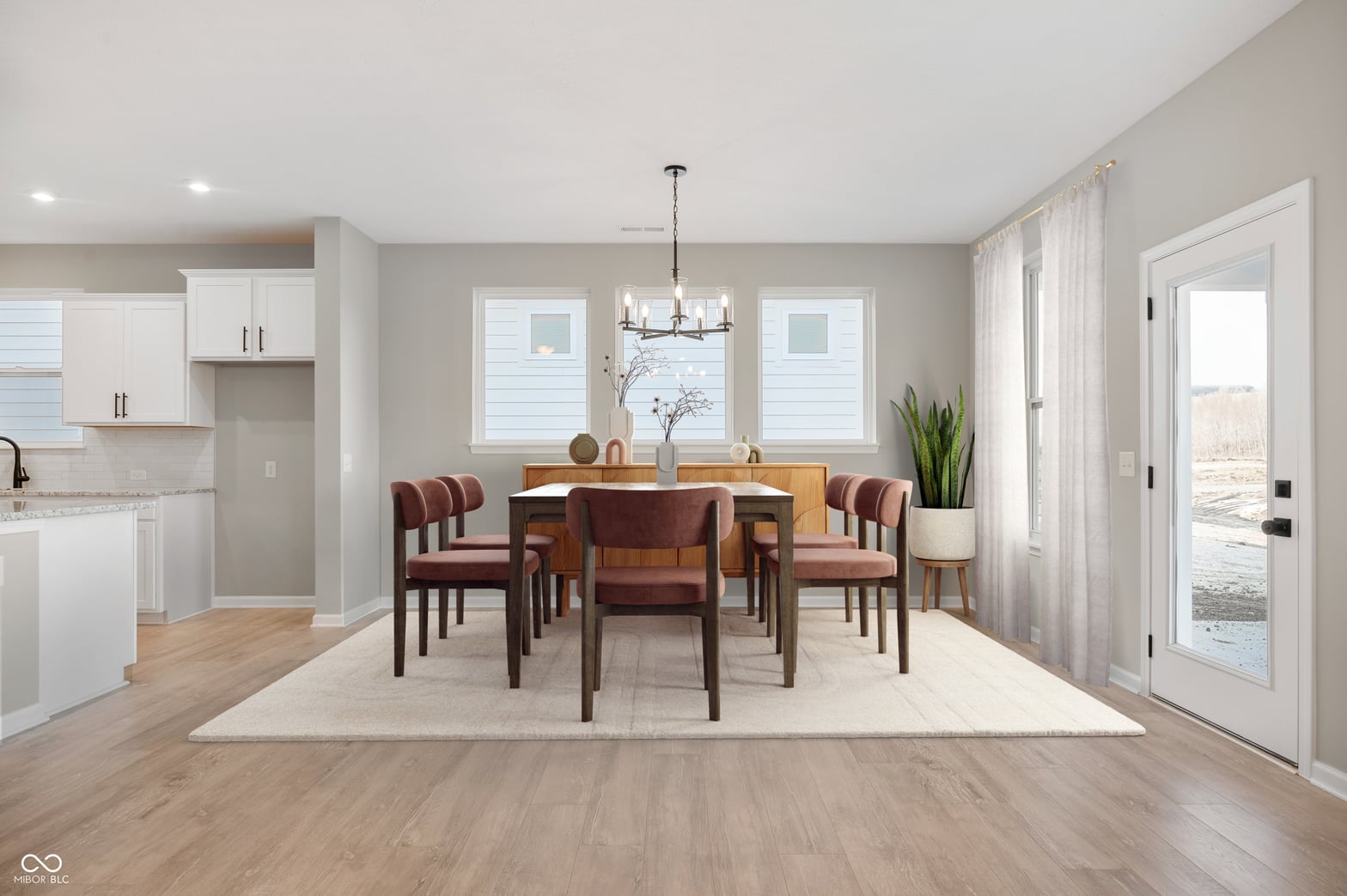 Bright open dining area with abundant natural light.