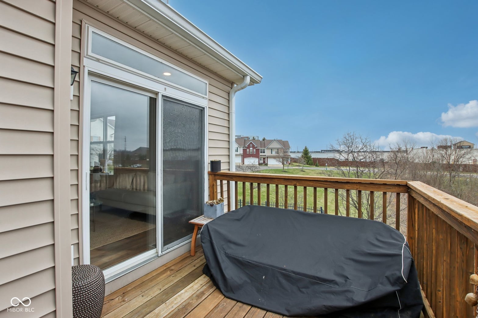 Elevated deck with expansive neighborhood views and direct access.