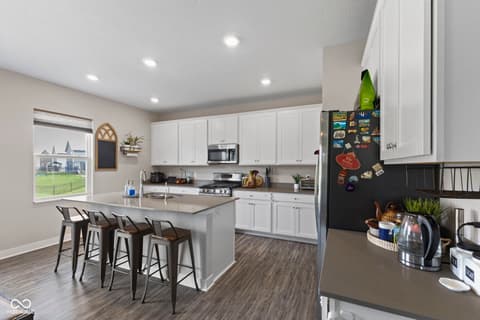 Kitchen at 16352 Sedalia Drive, Fishers, IN — Modern kitchen with large island and premium finishes.