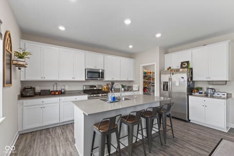 Kitchen at 16352 Sedalia Drive, Fishers, IN — Stunning modern kitchen with island and premium finishes.