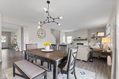 Dining room at 16352 Sedalia Drive, Fishers, IN — Modern open-concept dining with stylish pendant lighting.
