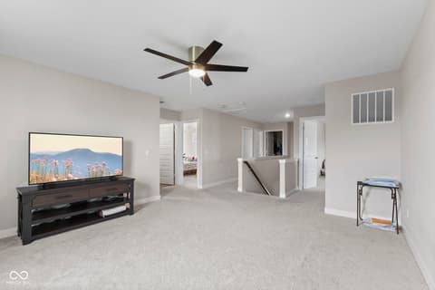 Family room at 16352 Sedalia Drive, Fishers, IN — Spacious open concept family room with modern finishes.