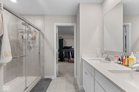 Primary bathroom at 16352 Sedalia Drive, Fishers, IN — Spacious primary bath with dual vanity and walk-in shower.