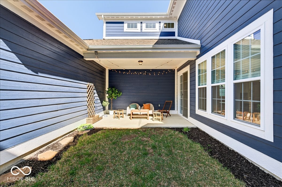 Modern backyard oasis with patio and entertainment space.