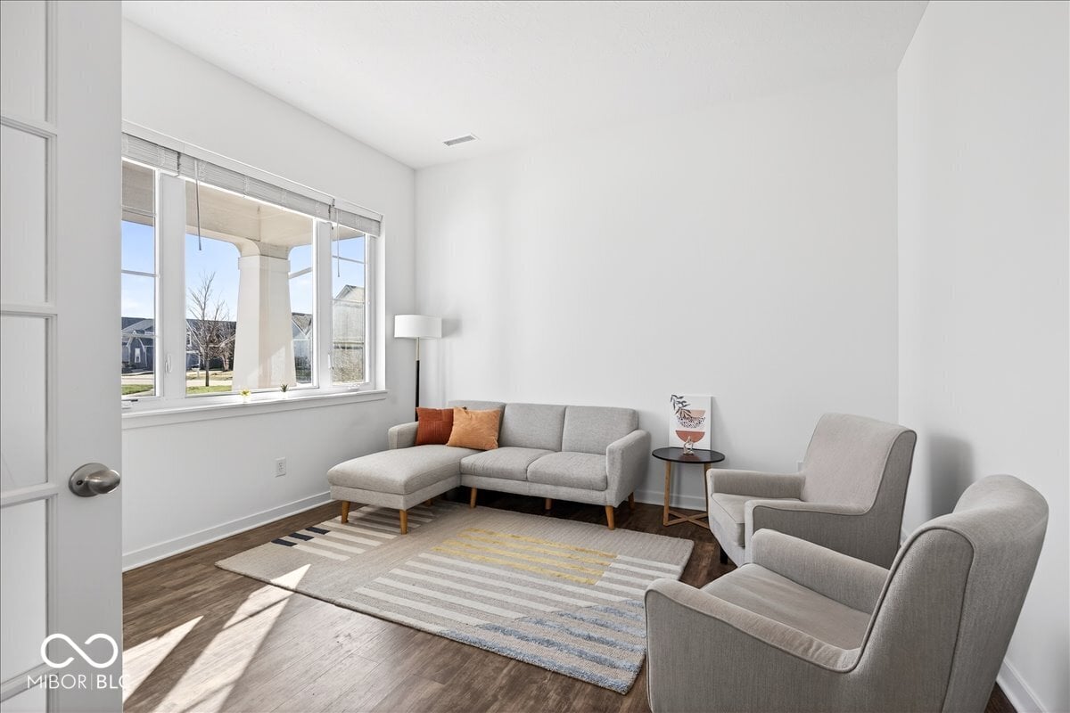 Bright contemporary living room with abundant natural light.
