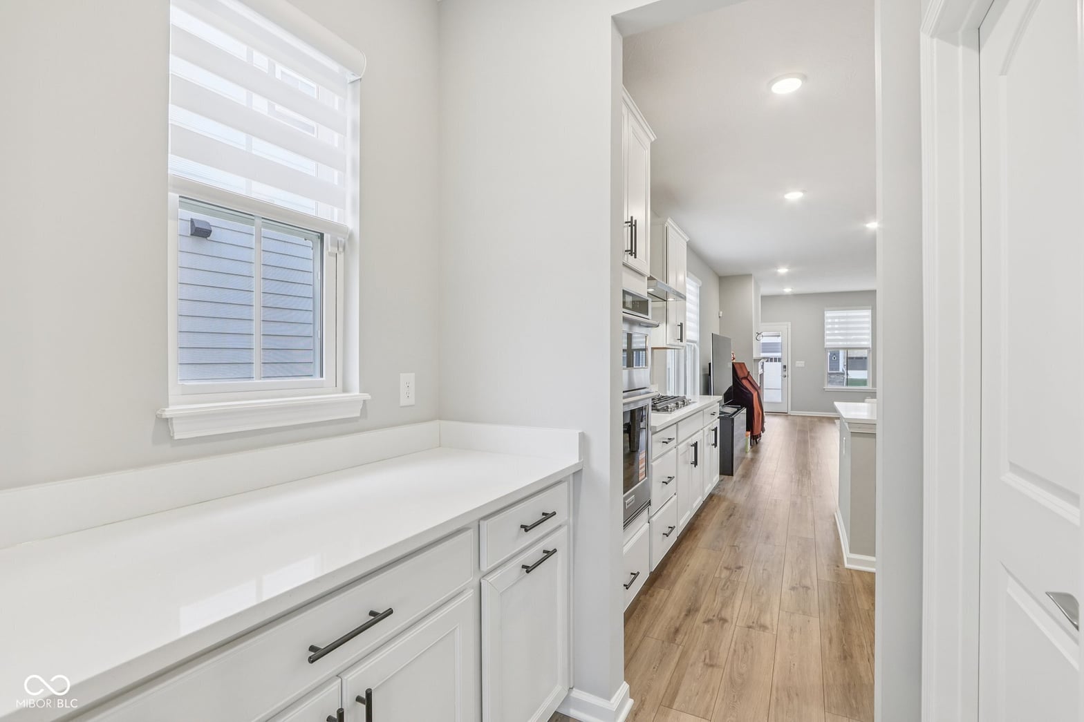 Bright contemporary kitchen with premium finishes and natural light.