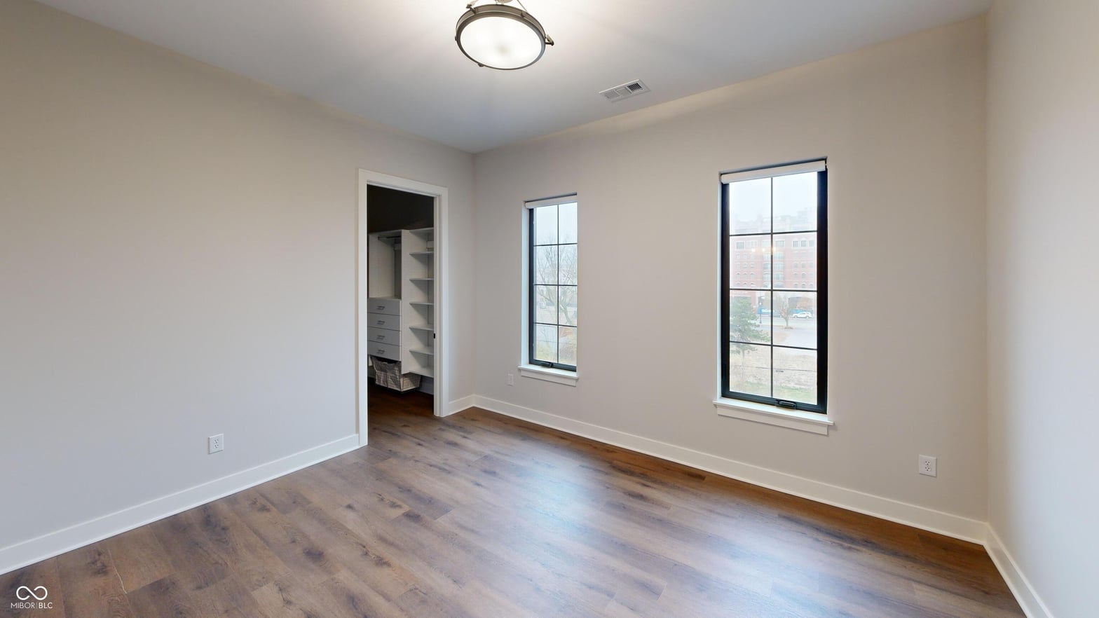 Bright, spacious bedroom with abundant natural light.
