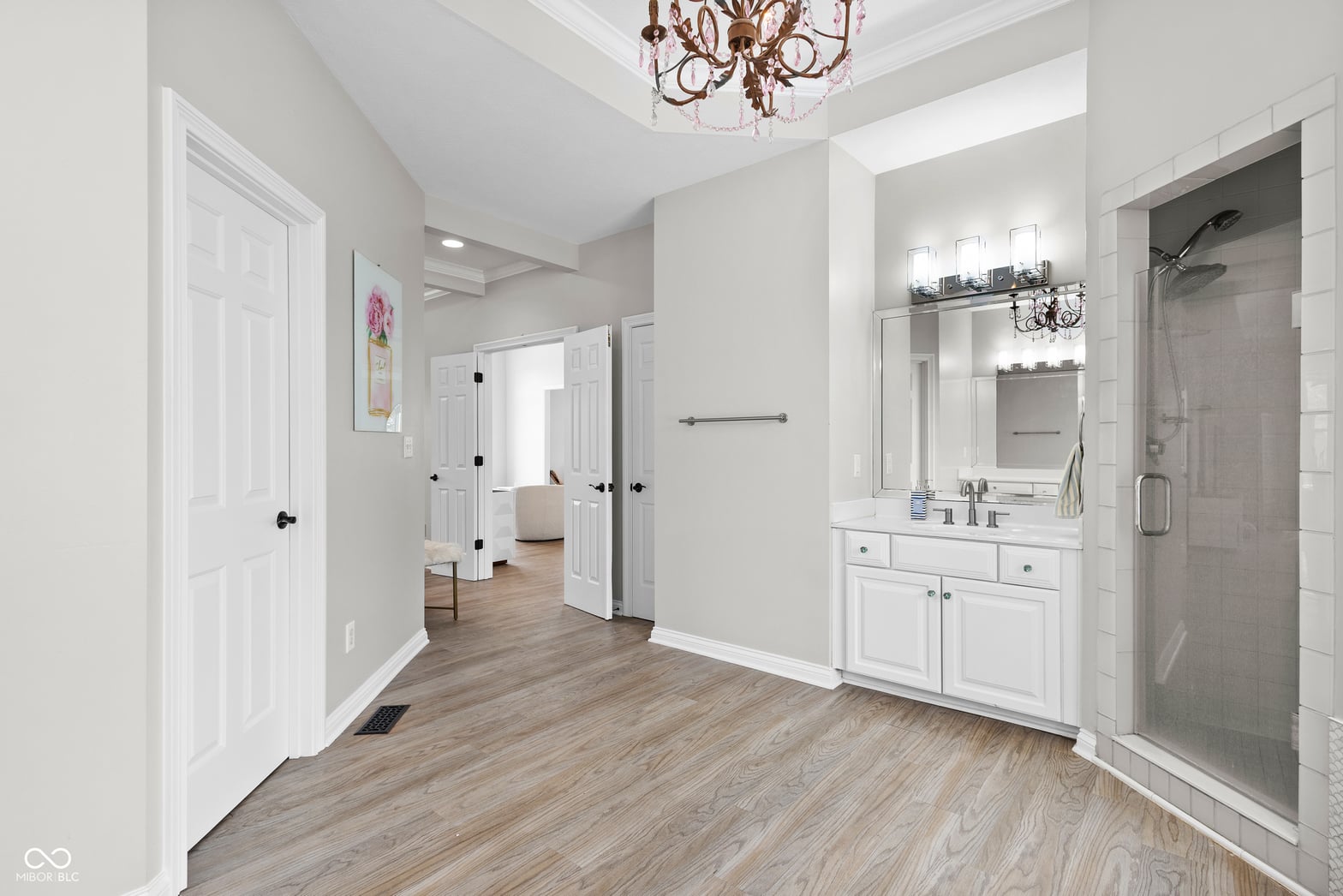 Bright, spacious primary bath with luxe finishes.