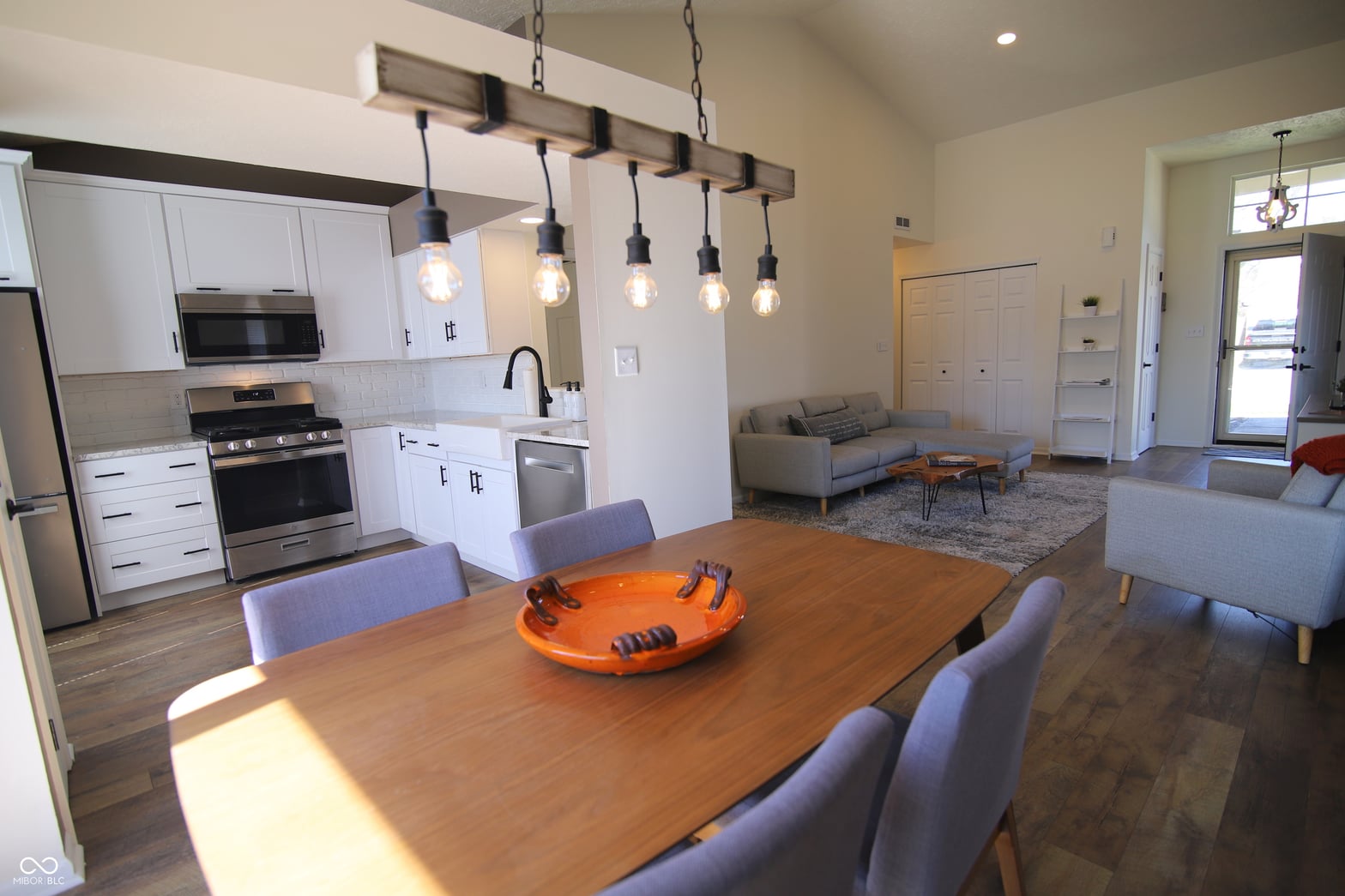 Bright open kitchen with modern fixtures and finishes.