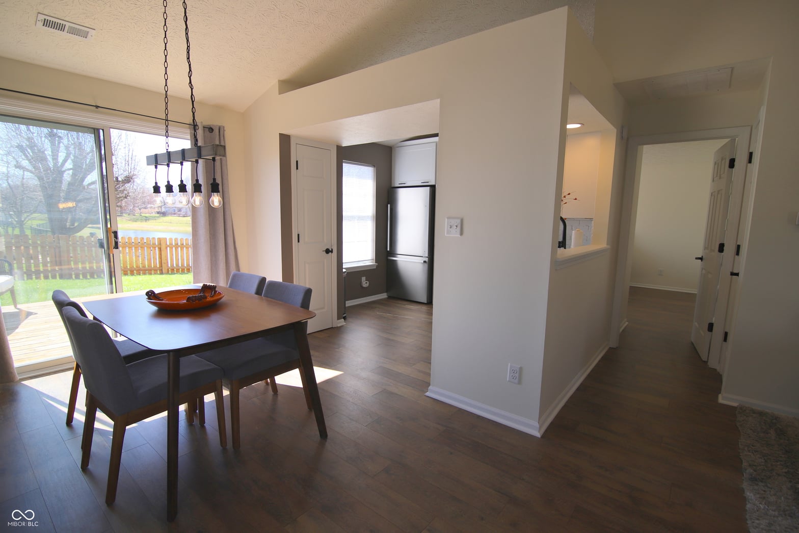 Open concept dining with modern finishes and natural light.