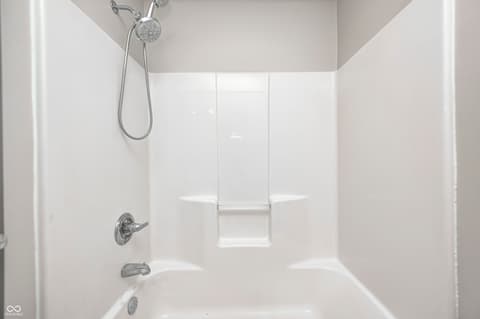 Bathroom at 12673 Ladson Street, Fishers, IN — Clean, modern bathroom with updated shower fixtures.
