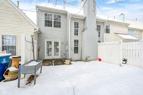 Backyard at 12673 Ladson Street, Fishers, IN — Spacious backyard with vinyl fencing and patio access.