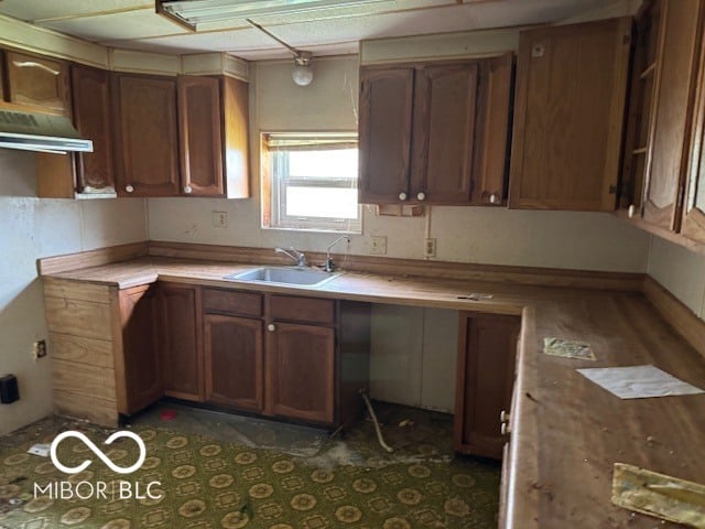 Spacious kitchen with solid wood cabinetry and ample counter space.