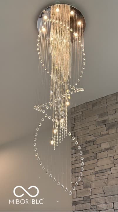 Foyer at 3565 Snowdon Drive, Westfield, IN — Stunning modern crystal chandelier in elegant foyer.