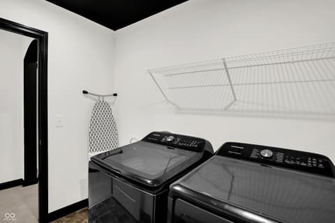 Laundry room at 3565 Snowdon Drive, Westfield, IN — Modern laundry room with premium Samsung washer and dryer.