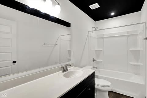 Bathroom at 3565 Snowdon Drive, Westfield, IN — Modern bathroom with sleek black and white finishes.