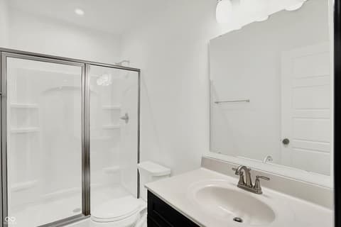 Primary bathroom at 3565 Snowdon Drive, Westfield, IN — Bright, modern primary bath with spacious walk-in shower.